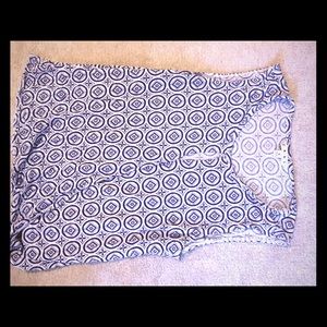 Tank with peekaboo and gathered hem.